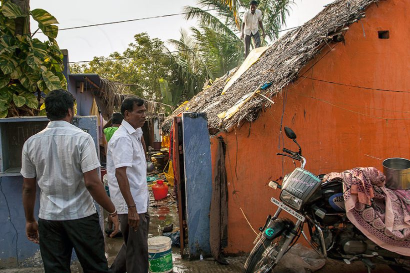 This must be the owner of the house. Look at the concern on his face in contrast to the people on the previous photo.